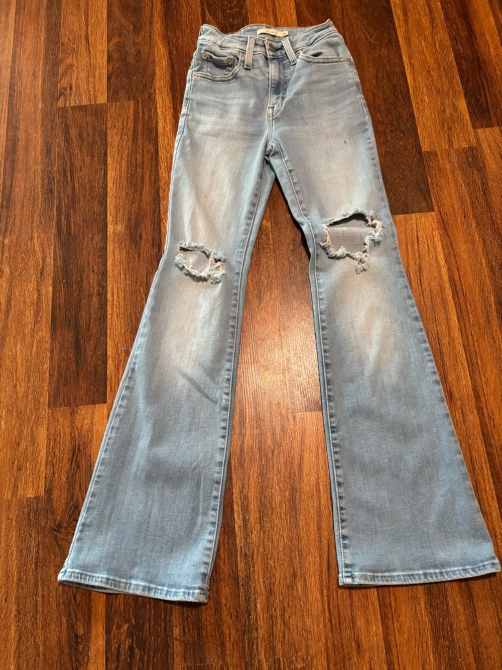 Levi’s High-Rise Light Blue Distressed Flare Jeans for Women